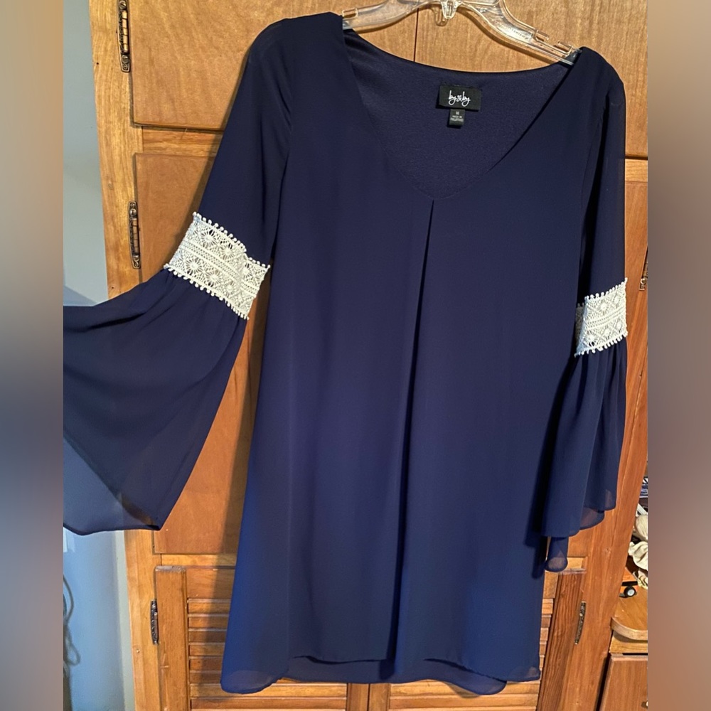 By and Bye brand Navy Blue dress with flare arms. Like new.